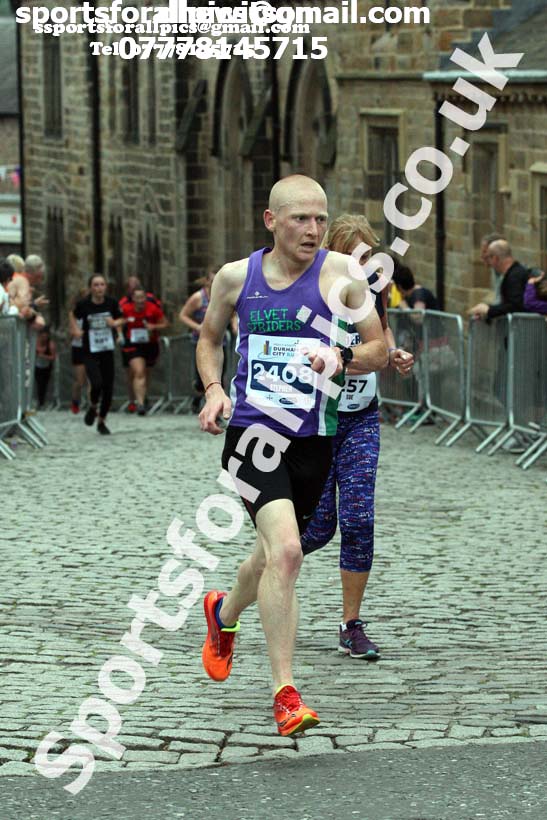 Stephen Jackson (Elvet Striders) wins the 10k, 2017 Durham City Run 5k and 10k Road Race. Photo: David T. Hewitson/Sports for All Pics